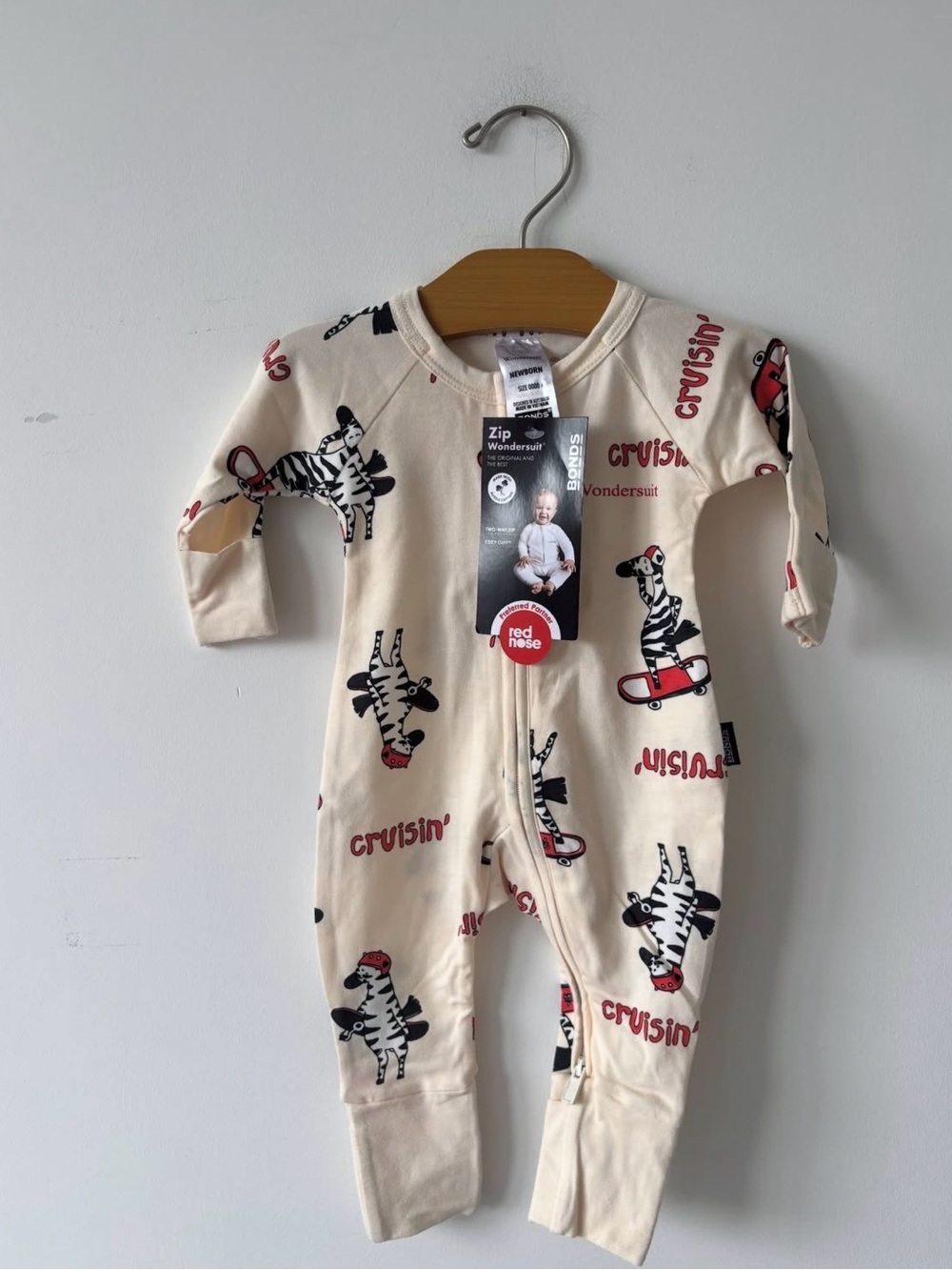 Bonds Cream Cruisin' Zebra Zip Wondersuit with Red Accents